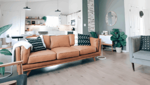 “Professional cleaning service team performing scheduled home cleaning, including vacuuming, dusting, and organized room maintenance”