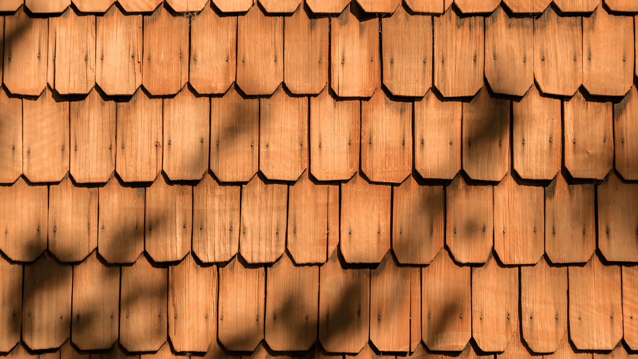“Home roof with visible wear and damage highlighting signs that indicate the right time for roof replacement and maintenance planning”