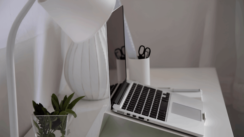 Compact home office setup designed for small spaces, optimized to improve laptop performance and productivity.