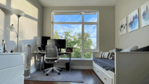 Minimalist home office setup with clean desk design, organized workspace, modern furniture, and creative elements that enhance productivity and focus.