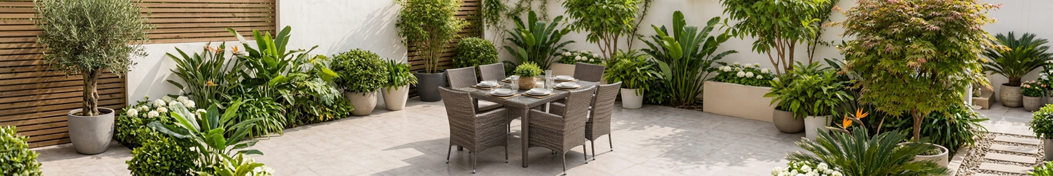 Outdoor rattan dining set with table and chairs on a garden patio