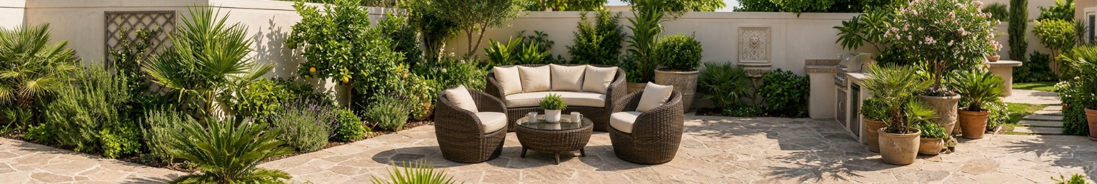Outdoor rattan sofa set with cushions and coffee table on a garden patio